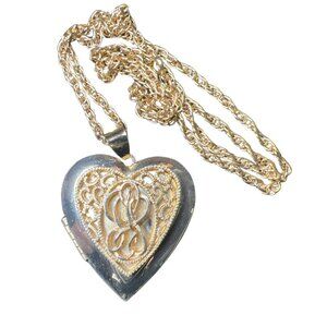 Heart Locket Filigree Decorated on Gold tone Rope Chain